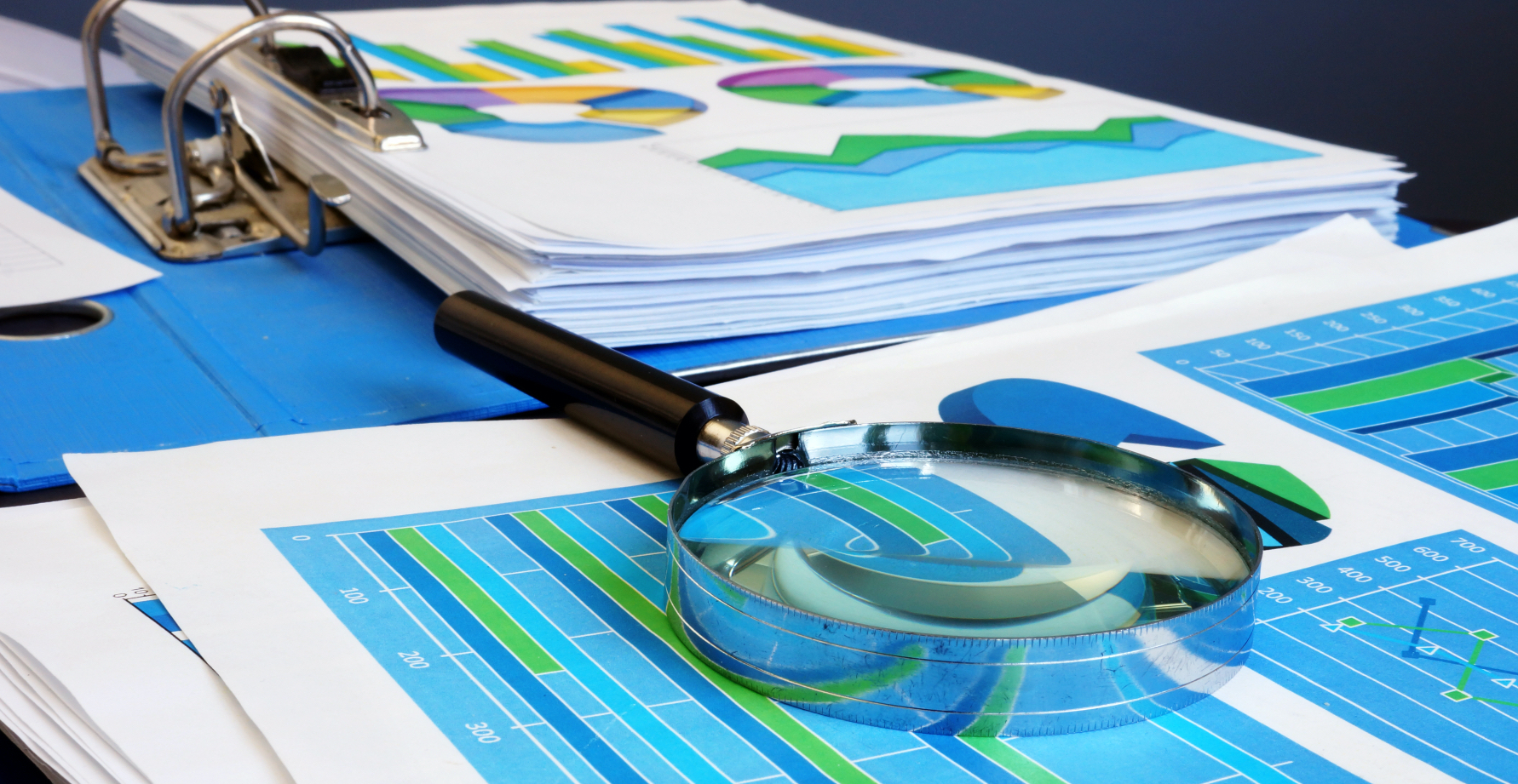 31866475-market-analysis-magnifying-glass-and-business-documents