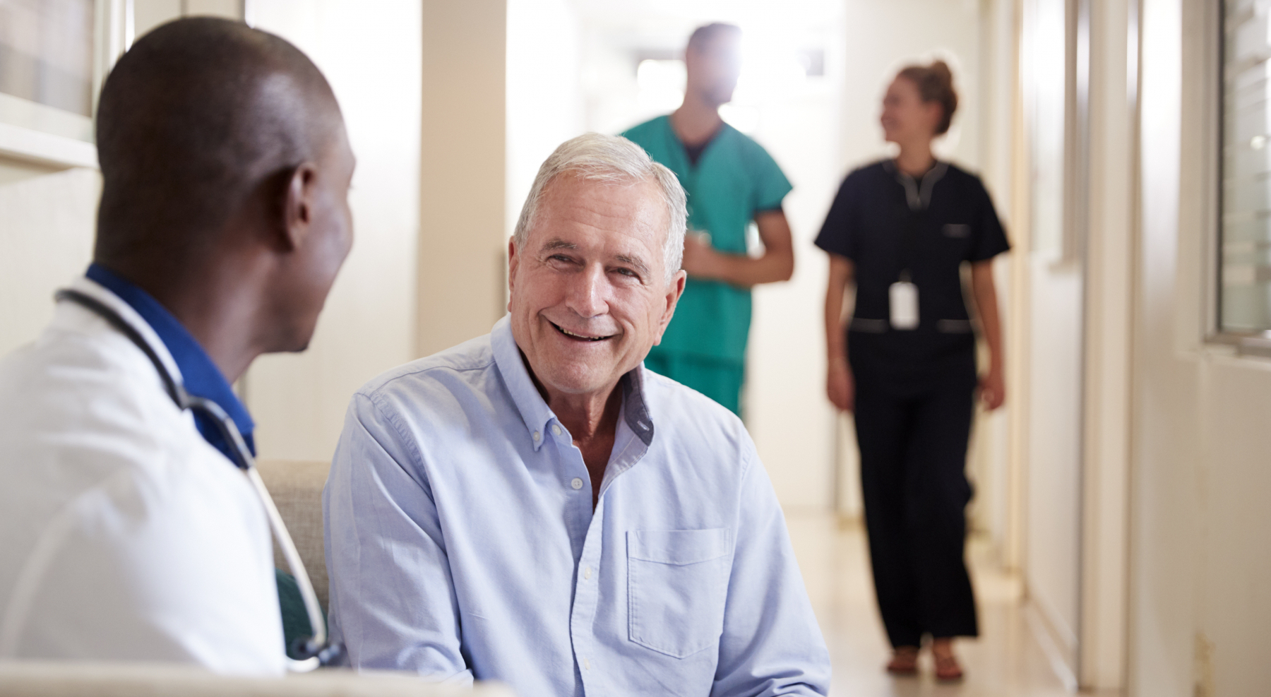 doctor-welcoming-to-senior-male-patient
